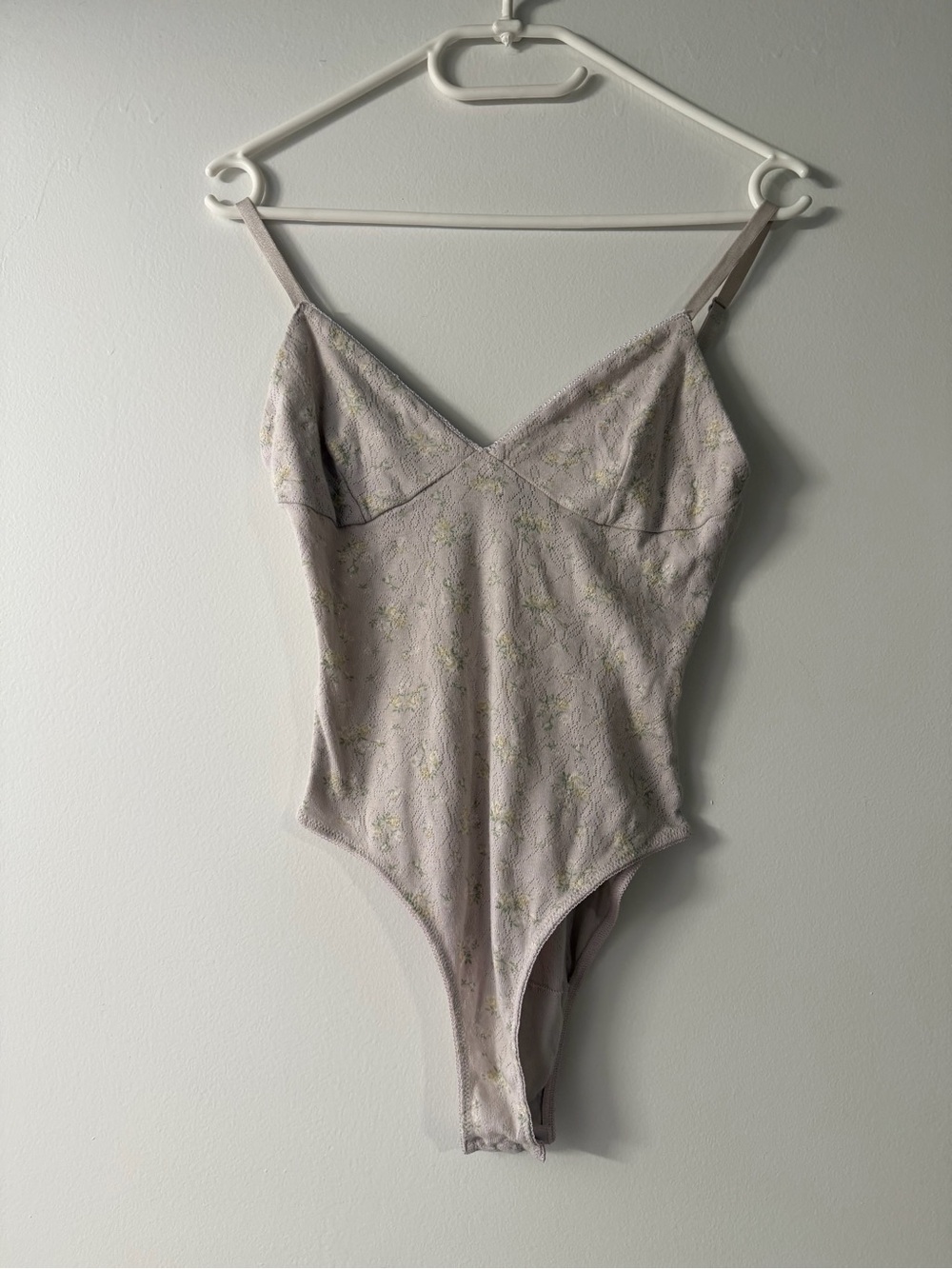 Rouje light pink floral bodysuit Size S.